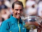 Rafael Nadal poses with the trophy after winning the French Open on June 5, 2022