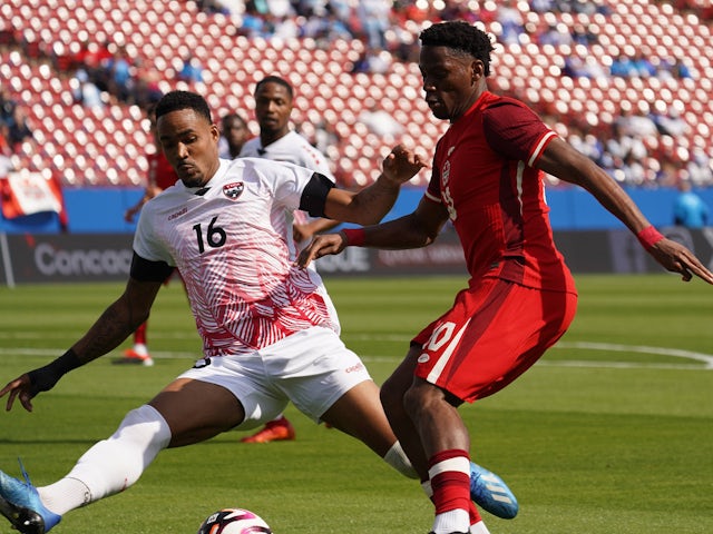 Alvin Jones of Trinidad and Tobago defends against Jonathan David on October 5, 2024