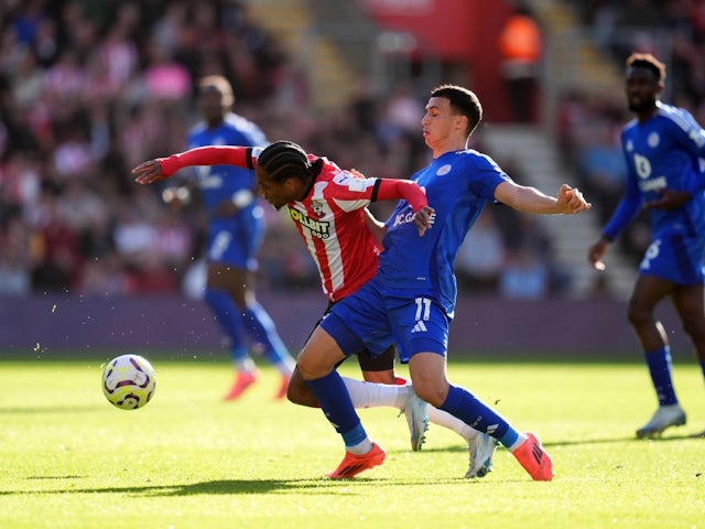 Southampton's Kyle Walker-Peters (left) and Leicester City's Bilal El Khannouss battle for the ball during their side's Premier League match, on October 19, 2024