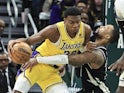  Los Angeles Lakers Rui Hachimura vies with Milwaukee Bucks Damian Lillard  on October 14, 2024