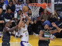  Jaxon Hayes 11 of the Los Angeles Lakers is blocked as he goes for a shot during their NBA, Basketball Herren, USA game against the Minnesota Timberwolves on October 18, 2024