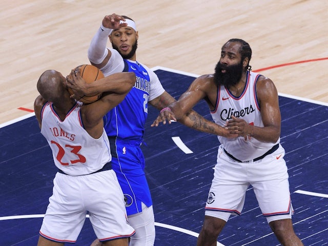 Kai Jones and James Harden of the Los Angeles Clippers in action against the Dallas Mavericks on October 14, 2024