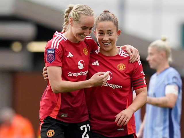 Manchester United Women's Maya Le Tissier celebrates with Millie Turner on October 13, 2024