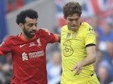 Liverpool's Mohamed Salah in action with Chelsea's Marcos Alonso on May 14, 2022