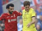 Liverpool's Mohamed Salah in action with Chelsea's Marcos Alonso on May 14, 2022