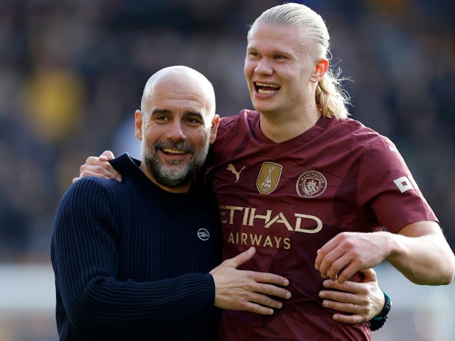 Manchester City manager Pep Guardiola celebrates with Erling Haaland on October 20, 2024