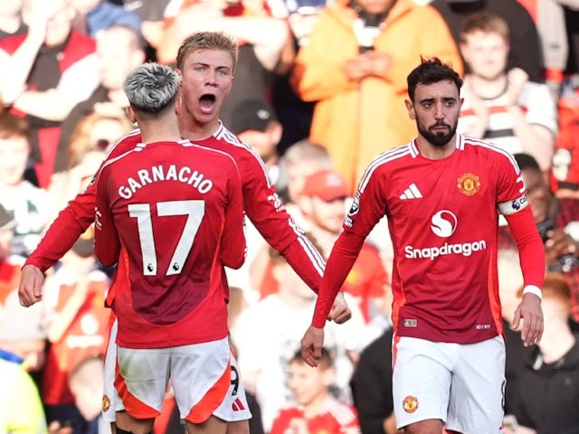 Manchester United's Rasmus Hojlund celebrates scoring with Alejandro Garnacho and Bruno Fernandes on October 19, 2024