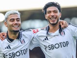 Fulham's Raul Jimenez and Andreas Pereira celebrate on October 19, 2024