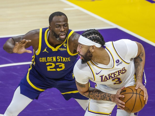  Los Angeles Lakers Anthony Davis is defended by Golden State Warriors Draymond Green October 14, 2024