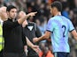 Arsenal manager Mikel Arteta gestures as William Saliba of Arsenal walks off after being shown a is shown a red card during his side's match against Bournemouth, on October 19, 2024