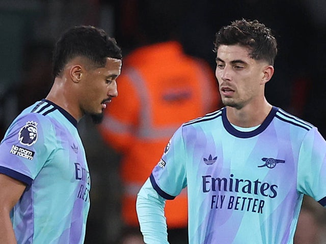 Arsenal's William Saliba and Kai Havertz react after the former is sent off on October 19, 2024