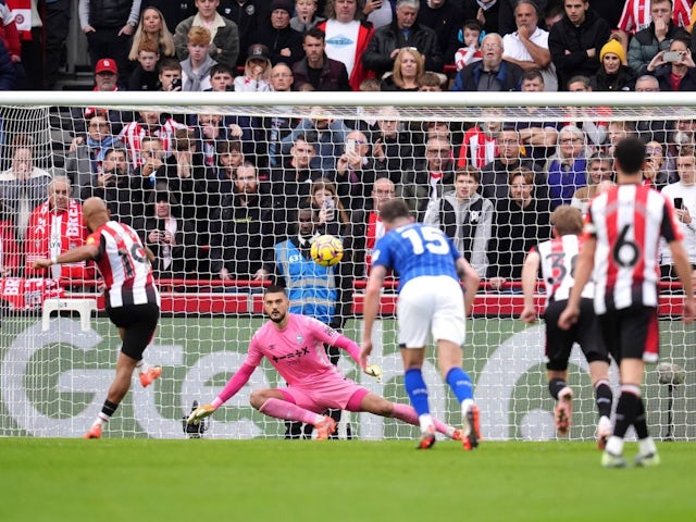 Brentford's Bryan Mbeumo scores his side's third goal of the game against Ipswich Town during their Premier League clash, on October 26, 2024