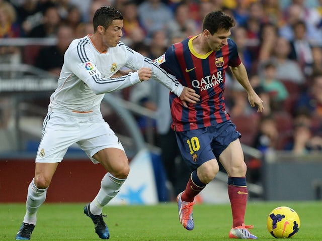 Cristiano Ronaldo and Lionel Messi in action for Real Madrid and Barcelona on October 26, 2013