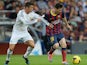 Cristiano Ronaldo and Lionel Messi in action for Real Madrid and Barcelona on October 26, 2013