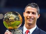 Manchester United's Cristiano Ronaldo poses with the men's Ballon d'Or trophy on December 10, 2008.