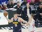 Denver Nuggets Nikola Jokic (L) is defended by Los Angeles Clippers Ivica Zubac on October 18, 2024