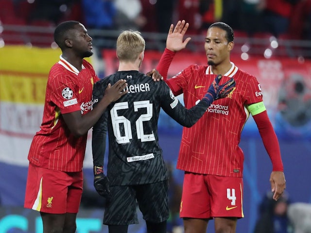 Ibrahima Konate, Caoimhin Kelleher and Virgil van Dijk of Liverpool during their side's match against RB Leipzig, on October 23, 2024