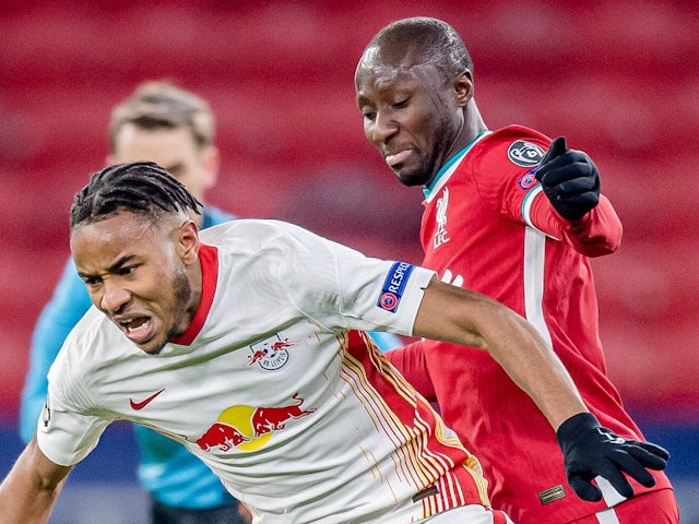 Liverpool's Naby Keita in action with RB Leipzig's Christopher Nkunku on March 10, 2021