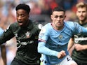 Southampton's Kyle Walker-Peters in action with Manchester City's Phil Foden on October 8, 2022