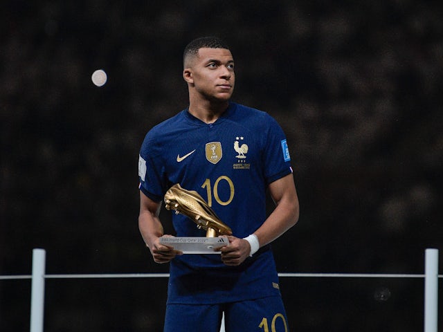 France's Kylian Mbappe with the World Cup Golden Boot on December 18, 2022