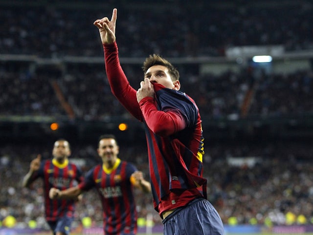 Barcelona's Lionel Messi celebrates scoring on March 23, 2014