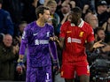 Liverpool goalkeeper Alisson Becker (L) and Ibrahima Konate on October 18, 2024