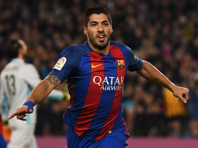 Luis Suarez celebrates scoring for Barcelona on December 18, 2016