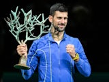 Novak Djokovic poses with the trophy after winning the Paris Masters on November 5, 2023