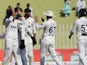 Pakistan celebrate a wicket during third Test against England on October 26.