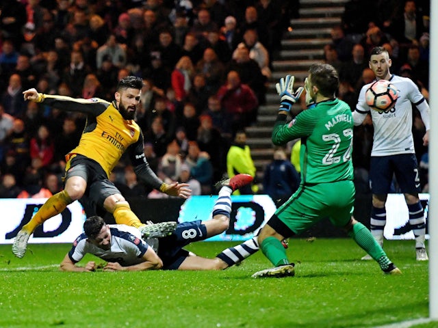 Arsenal's Olivier Giroud scores his side's second goal of the game during the Emirates FA Cup Third Round match at Deepdale, Preston on 7th January 2017