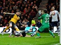 Arsenal's Olivier Giroud scores his side's second goal of the game during the Emirates FA Cup Third Round match at Deepdale, Preston on 7th January 2017