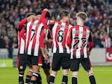 Brentford players celebrate after Kevin Schade's goal on October 29, 2024