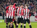 Brentford players celebrate after Kevin Schade's goal on October 29, 2024