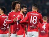 Manchester United's Bruno Fernandes celebrates with Joshua Zirkzee and Casemiro after scoring on October 30, 2024