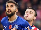 Dominic Calvert-Lewin of Everton FC battles with Taylor Harwood-Bellis of Southampton FC on November 2, 2024