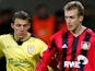 Bayer Leverkusen's Daniel Bierofka and Liverpool's Stephen Warnock pictured on March 9, 2005