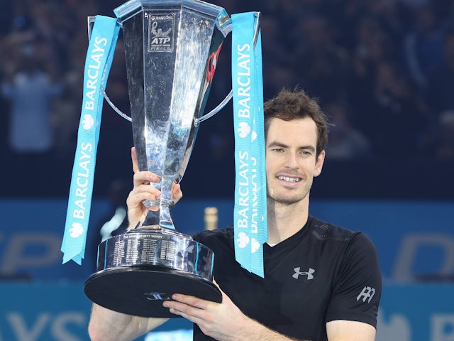 Andy Murray poses with the trophy after winning the ATP Finals on November 20, 2016