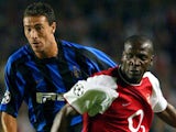 Arsenal's Lauren in action with Inter Milan's Kily Gonzalez on September 17, 2003