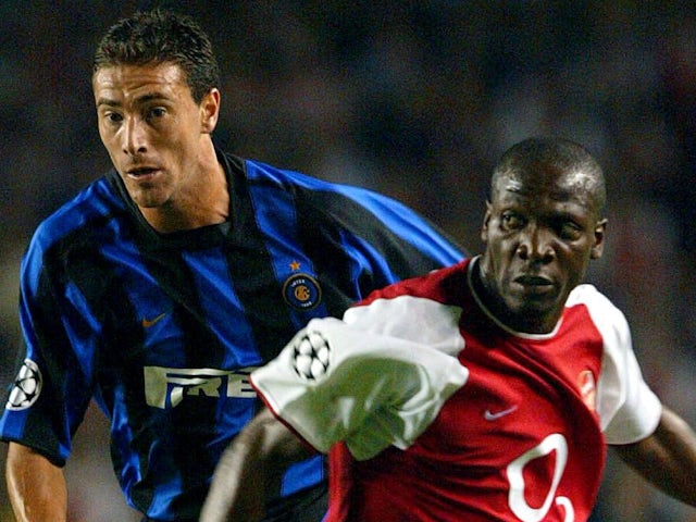 Arsenal's Lauren in action with Inter Milan's Kily Gonzalez on September 17, 2003