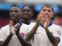 Chelsea's Moises Caicedo and Enzo Fernandez applaud the fans on September 21, 2024