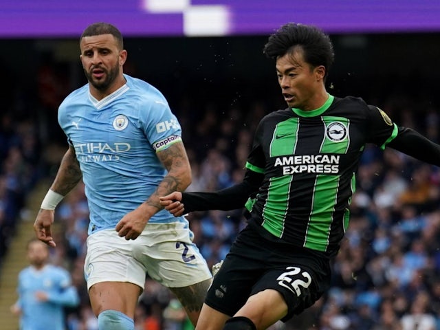 Manchester City's Kyle Walker in action with Brighton & Hove Albion's Kaoru Mitoma on October 21, 2023