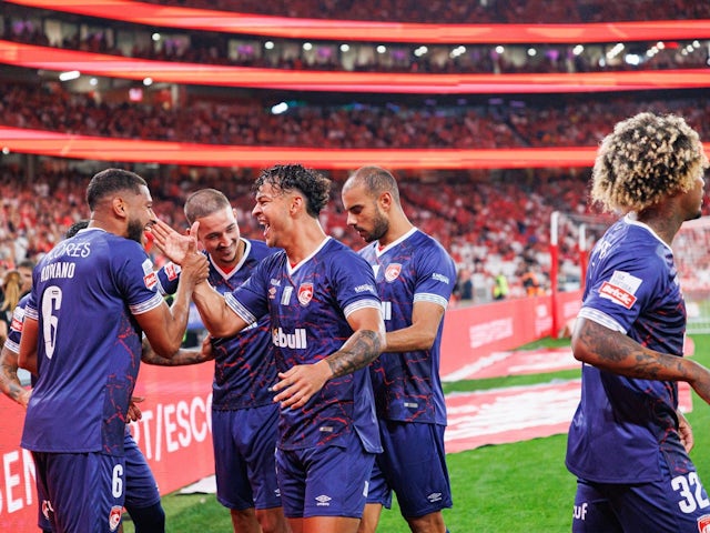 Santa Clara players celebrate after scoring a goal against Benfica on September 14, 2024