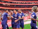 Santa Clara players celebrate after scoring a goal against Benfica on September 14, 2024