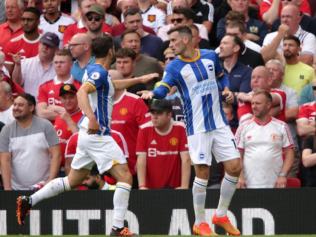 Brighton & Hove Albion's Pascal Gross celebrates with Adam Lallana on August 7, 2022