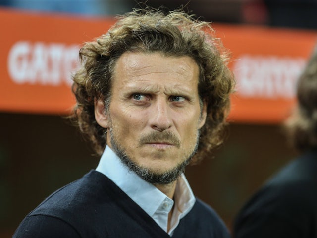 Forlan's still netting! Ex-Man United striker makes professional tennis debut