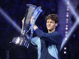 Jannik Sinner poses with the trophy after winning the ATP Finals on November 17, 2024