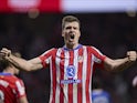 Atletico Madrid striker Alexander Sorloth celebrates scoring on November 23, 2024