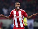 Olympiacos forward Ayoub El Kaabi celebrates scoring on November 24, 2024