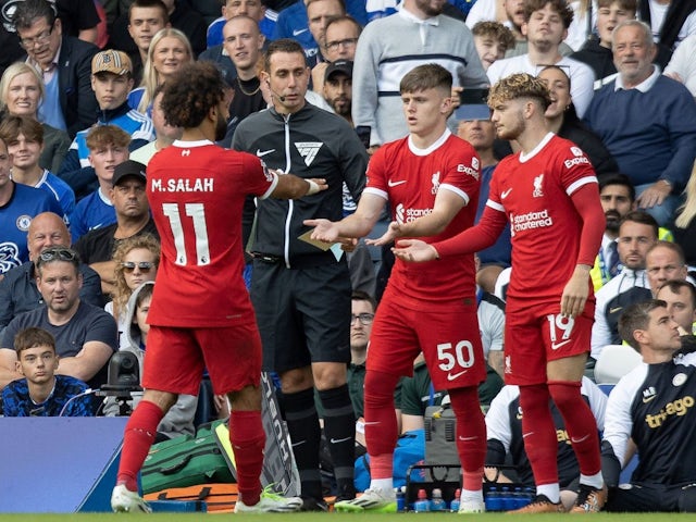 Liverpool forward Mohamed Salah substituted as Harvey Elliott (19) and Ben Doak (50) come on the pitch during their side's clash against Chelsea, on August 13, 2023