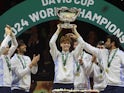 Jannik Sinner lifts the trophy after Italy win the Davis Cup on November 24, 2024